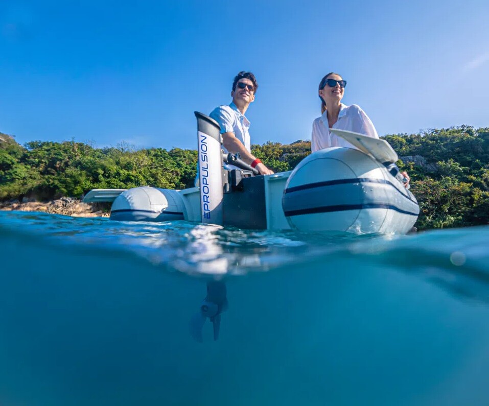 Image of two people on a boat with an eLite.